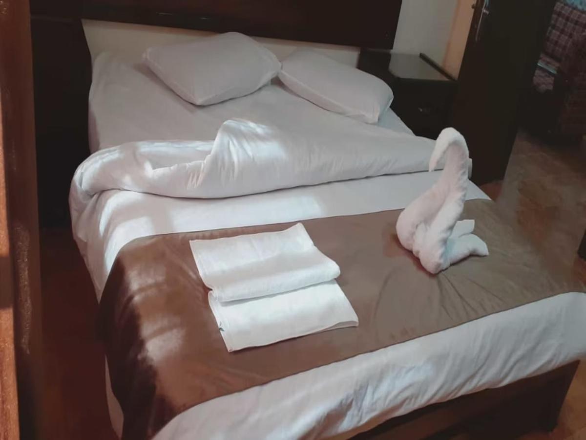 Al-Nujoom Hotel Suites Amman Eksteriør billede
